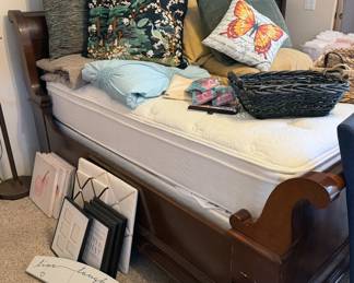 Full size wooden sleigh bed with Simmons Beautyrest Regency Eurotop Plush full mattress + box spring; assorted throw pillows + bed linens