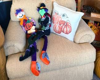 Upholstered armchair with fall decor