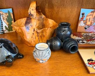 Southwest pottery, tiles, and wooden basket
