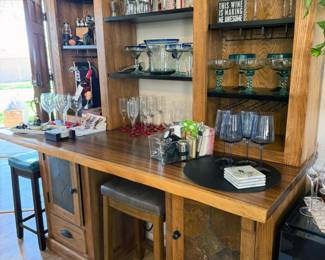 Belly up to the bar! Solid wood with shelves + cabinets; glasswares and bar accessoried