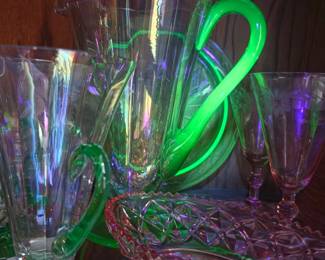 Antique iridescent and uranium glass pitcher and glass set