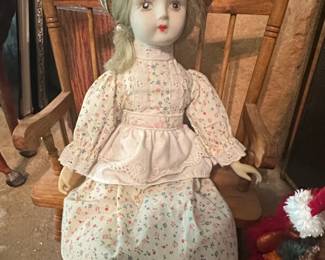 Vintage Porcelain Collector Doll in Rocking Chair
