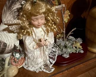 Porcelain Angel Figurine with Bluebird