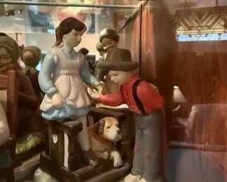 Vintage Porcelain Figurine of a Boy and Girl with Dog