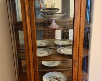 Bow-front antique china cabinet