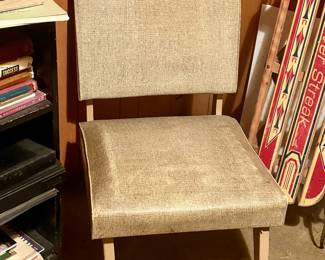 Vintage occassional chair with legs that fold under. 