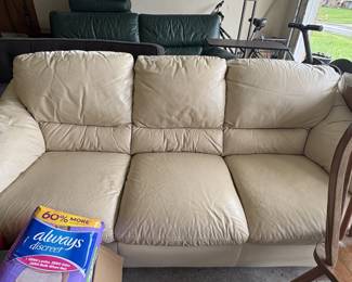 White Leather Couch with matching oversized chair in good condition (available for sale before the sale)