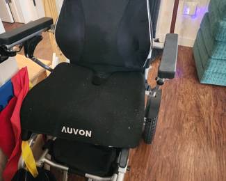 Porto Mobility Ranger Quatro motorized wheel chair with padded seats and rain cover