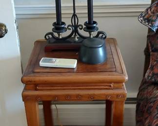 Wooden nightstand. Unique metal lamp