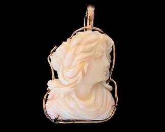 Rare and beautiful freeform high relief Art Nouveau angel skin shell cameo in 14k gold. 