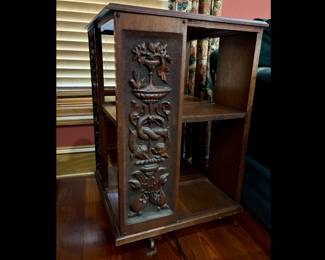 Antique English oak carved revolving bookcase. 