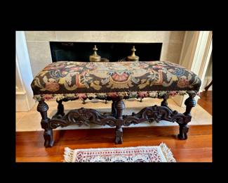 Late 19th century English Tudor style heavily carved tapestry bench