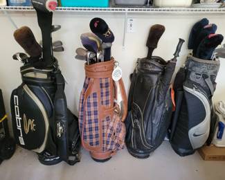 3 Sets of clubs, 4 bags