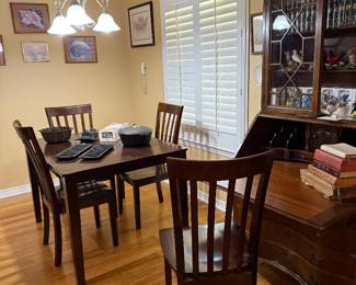 Wooden table w/ 4 chairs & Secretary w/ claw feet