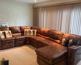 La-Z-Boy leather section with recliners and pull out bed