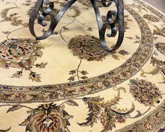 Round Wool rug approx size is 8 ' round