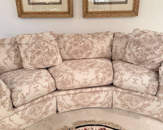 Thomasville curved conversation sofa with a jacquard style fabric