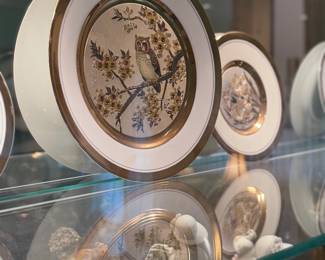 Porcelain plates with gilding featuring owls