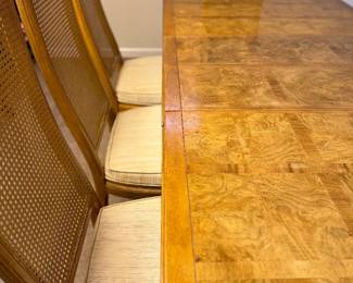 detail of the caned chairs and upholstered seats