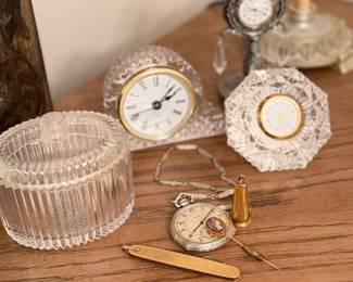 small collection of tiny crystal clocks