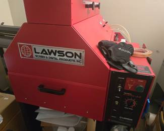 Lawson Zoom AE, DTG pretreat machine Applies an even, repeatable coat of pretreatment to garments before DTG printing, which helps colors print brighter and sharper, especially on dark shirts. It pairs with the Epson F2100. Accessories included.