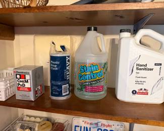 Cleaning supplies including hand sanitizer, stain remover and Comet