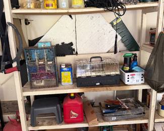 Garage shelving unit with household and garden supplies