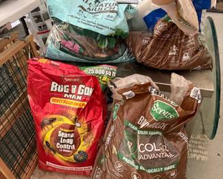 Bagged mulch, potting soil and lawn fertilizer