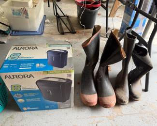 Boxed Aurora shredders and tall rubber work boots
