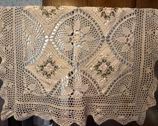 Crocheted lace tablecloth with floral medallion pattern
