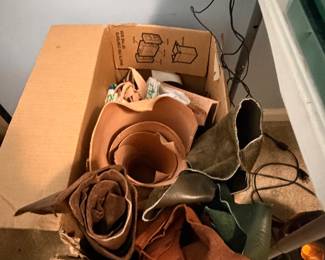 Box of leather belts
