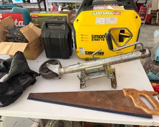 Champion 2500 watt portable generator with hand saws and grease gun