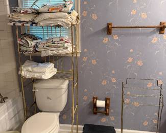 Bathroom with wire shelving and storage stand