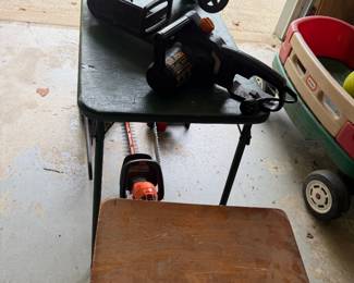 Wood side table with cordless power tool