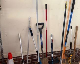 Long handled garden tools, shovels and traffic cone