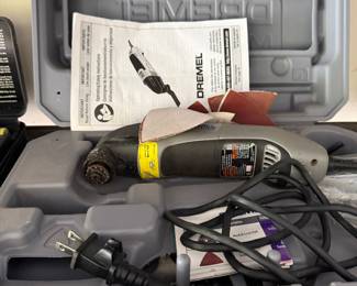 Dremel rotary tool with accessories in carrying case