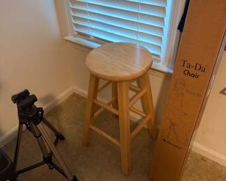 Wooden stool, camera tripod and storage boxes
