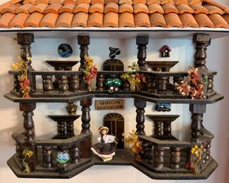 Decorative tiled roof display shelf with miniature figures