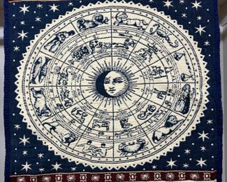 Celestial zodiac tapestry with sun face and astrological signs on navy