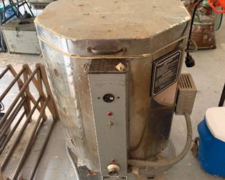 Water heater with wooden sawhorses