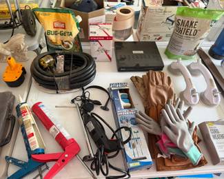 Work gloves, insect killer, extension cords and hand tools