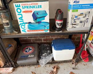 Aqua Joe oscillating sprinkler, first aid kit and cooler