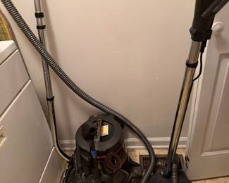 Canister vacuum cleaner with attachments