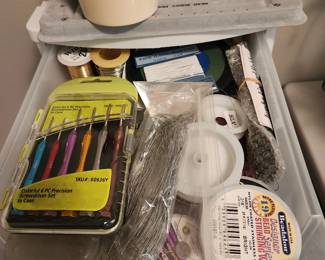 Trays of beads and jewelry making accessories