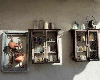 Rustic Wall Cabinets with Chicken Wire Doors, Antique Bottles and Insulators