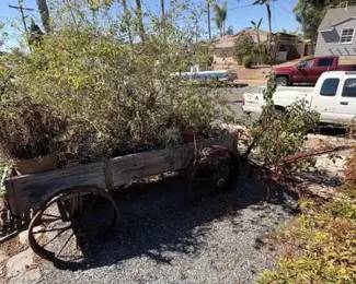 Rustic Wood Farm Wagon Planter with Iron Spoke Wheels and HorseDrawn Cultivator