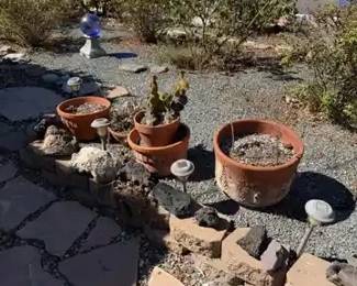 Assortment of Terracotta Garden Planters, Solar Path Lights and Lava Rocks