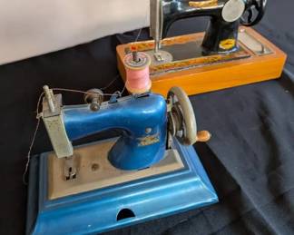 Charming Toy Hand Crank Sewing Machine Pair, Casige Blue and Belarus Wood Base