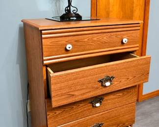 Lot 119 lamp  chest of drawers detail