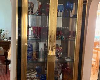 Large lighted curio cabinet witn storage space in bottom cabinet